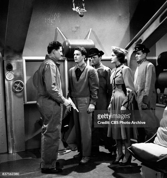 "Rod Brown of the Rocket Rangers" the CBS television science fiction series, broadcast live. Pictured the cast including Cliff Robertson , second...