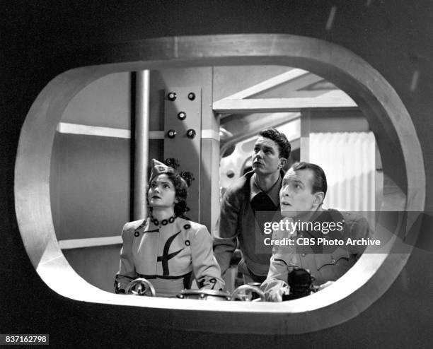 "Rod Brown of the Rocket Rangers" the CBS television science fiction series, broadcast live. Pictured from left: actress Shirley Standlee, Cliff...