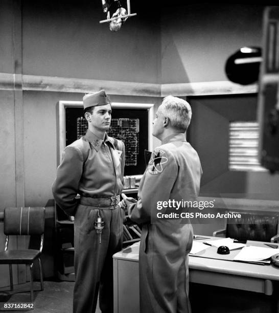 "Rod Brown of the Rocket Rangers" the CBS television science fiction series, broadcast live. Pictured from left: Cliff Robertson , John Boruff ....