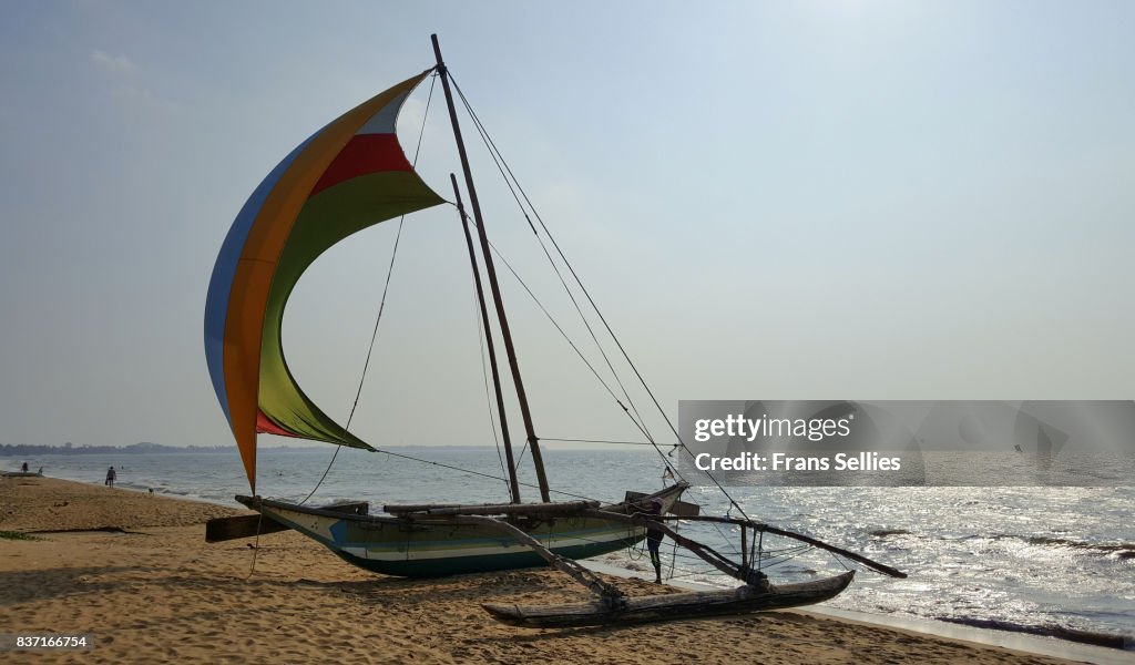 Traditional outrigger fishing boat (oruva), Negombo Beach, Sri Lanka.