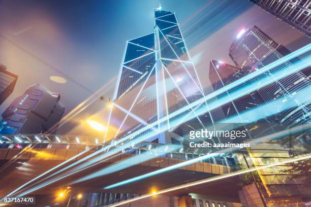 car trails in downtown of hong kong,china - hong kong business stock pictures, royalty-free photos & images