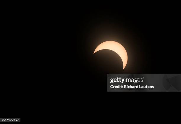 The solar eclipse hit toronto with approximately 3/4 totality. The sun is seen from Riverdale Park Esst.