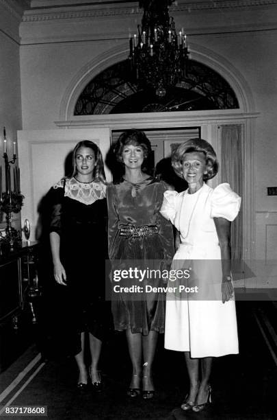 Headed to mansion party rooms are, from left, Mrs. Nebil Zarif, Mrs. Dottie Lamm, Mrs. Marvin Davis Credit: Denver Post