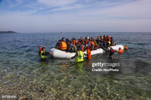 Refugees and migrants arriving at Lesvos island, Greece on March 12,2016. Refugees arriving at Lesvos in a rubber dinghy boat after they flee from...