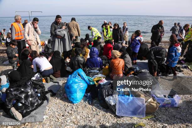 Refugees and migrants arriving at Lesvos island, Greece on March 12,2016. Refugees arriving at Lesvos in a rubber dinghy boat after they flee from...