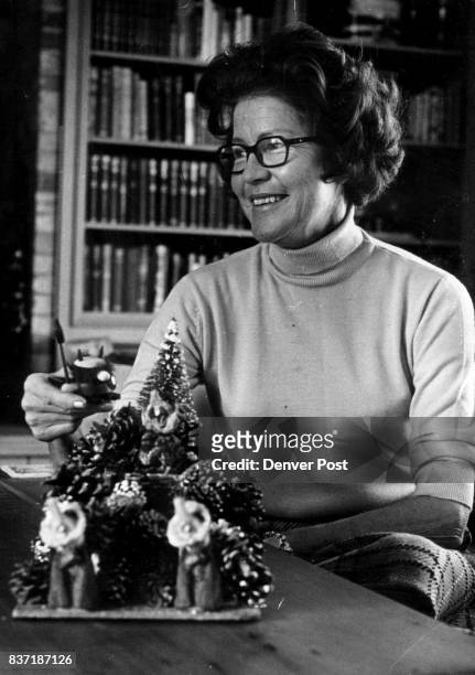 Mrs. Adolph Coors III, above, is decorating her house for Christmas, and along with Mrs. J. Ramsay Harris she's planning a Dec. 27 London evening at...