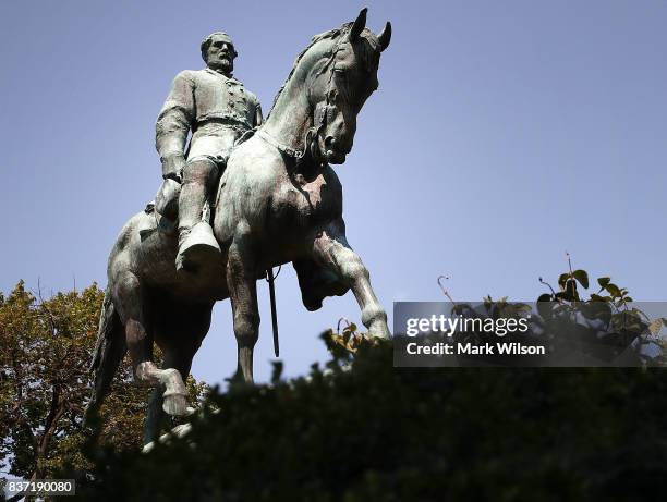 The statue of Confederate Gen. Robert E. Lee stands in the center of the renamed Emancipation Park on August 22, 2017 in Charlottesville, Virginia. A...