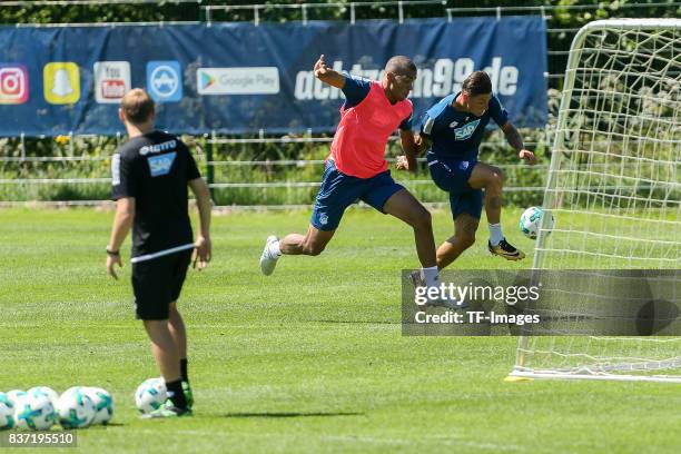 Kevin Akpoguma of Hoffenheim and Steven Zuber of Hoffenheim battle for the ball during the Training Camp of TSG 1899 Hoffenheim on July 16, 2017 in...