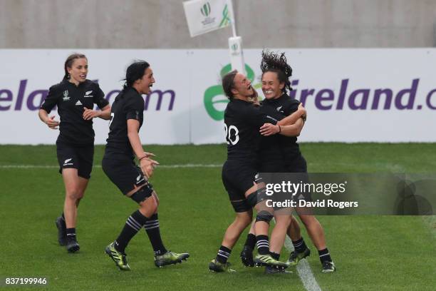 Portia Woodman of New Zealand celebrates with teammates after scoring her fourth try during the Women's Rugby World Cup 2017 Semi Final match between...