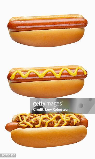 hot dogs on white - hotdog stock-fotos und bilder