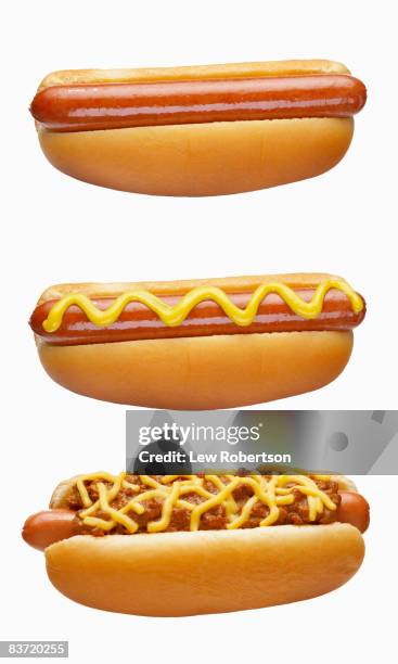 hot dogs on white - mostarda foto e immagini stock