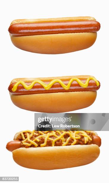 hot dogs on white - hotdog stockfoto's en -beelden