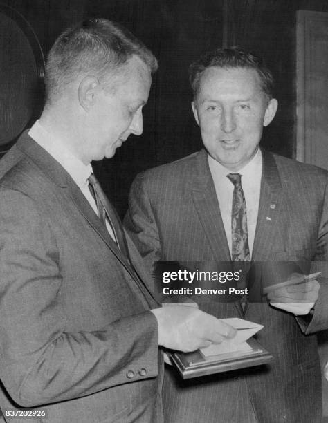 Mayor Tom Currigan, right, presents plaque to Smith, who was chosen for honor by a citizens' committee. Mrs. Julia G. Cabell, graduate nurse at...