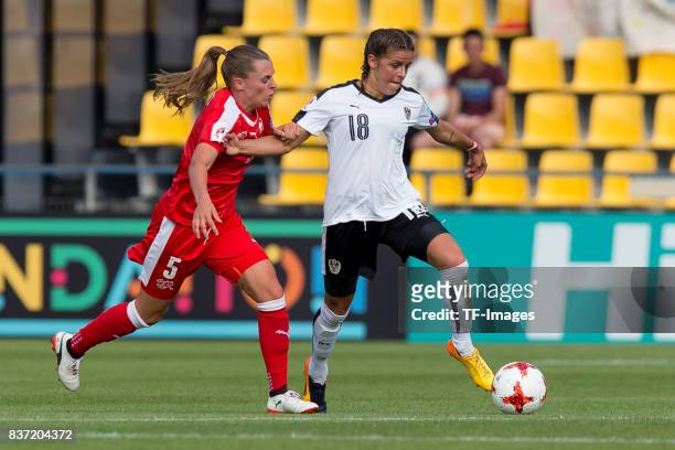 Noelle Maritz of Switzerland and Laura Feiersinger of Austria battle for the ball during the Group C match between Austria and Switzerland during the...