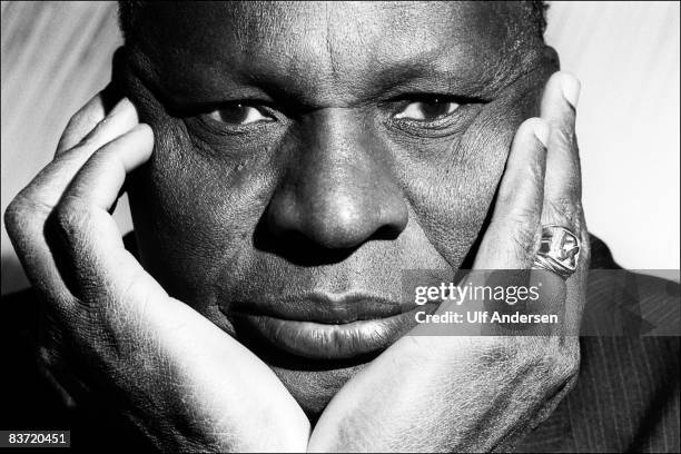 Ivorian Coast author Ahmadou Kourouma poses while in a studio in Paris,France on the 13th of December 1989.