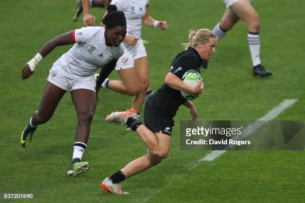 Kelly Brazier of New Zealand runs in her team's final try during the Women's Rugby World Cup 2017 Semi Final match between New Zealand and the United...