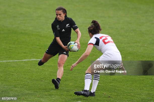 Selica Winiata of New Zealand passes the ball as Jess Wooden of the United States closes in during the Women's Rugby World Cup 2017 Semi Final match...