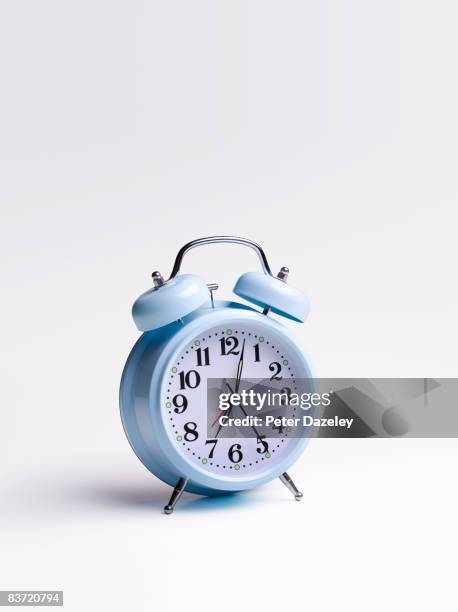 blue alarm clock on white background - 目覚まし時計 ストックフォトと画像