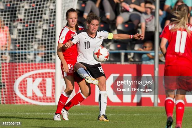 Lia Waelti of Switzerland and Nina Burger of Austria battle for the ball during the Group C match between Austria and Switzerland during the UEFA...