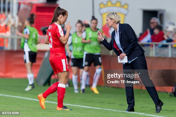 Lia Waelti of Switzerland speak with Head coach Martina Voss-Tecklenburg of Switzerland during the Group C match between Austria and Switzerland...