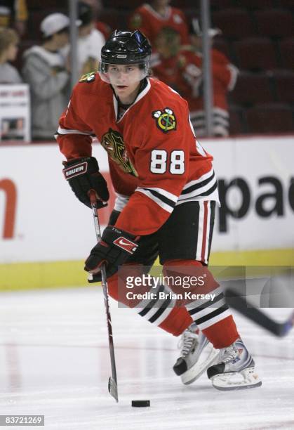 Patrick Kane of the Chicago Blackhawks skates with the puck during the shoot around before the game against the Boston Bruins at the United Center on...