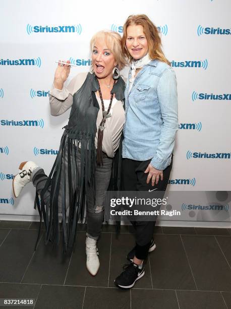 Recording artist Tanya Tucker and SiriusXM host Sandra Bernhard pose for a picture at SiriusXM Studios on August 22, 2017 in New York City.