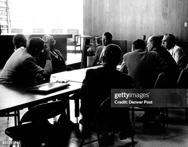 To R: Far side of Table, John Holloway - Resident Lawyer for ; Scott Tyler, Cu Police Information Director; Dr. Glen Barrett - CU Vice President for...