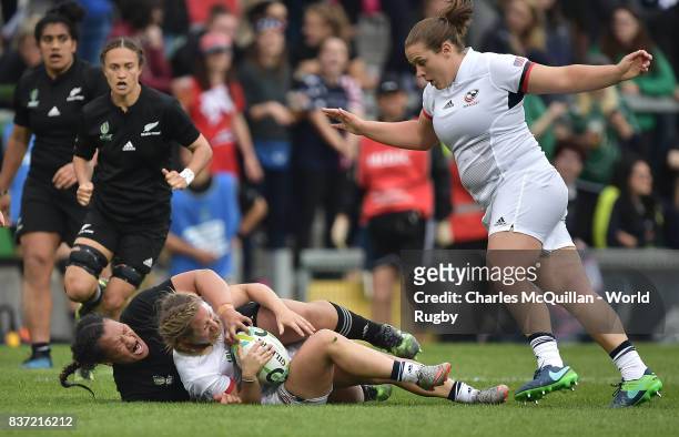 Toka Natua of New Zealand and Deven Owsiany of USA during the Womens Rugby World Cup semi-final between New Zealand and USA at the Kingspan Stadium...