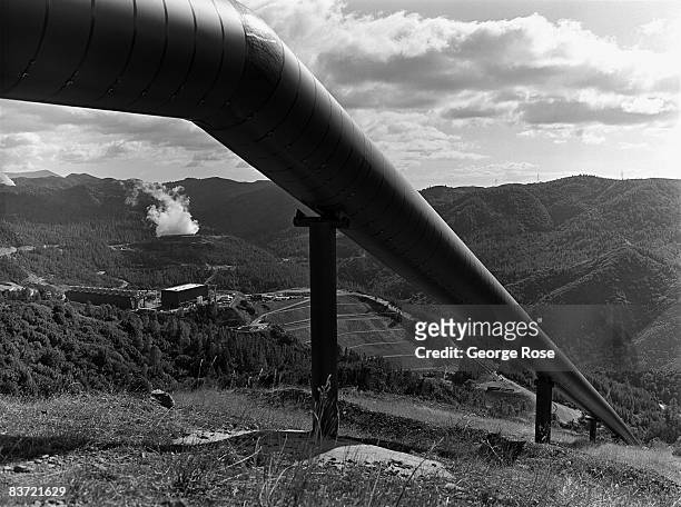 Steam flows through a pipeline to a turbine power plant to generate carbon and pollution free electrical energy in this 2008 Geyserville, California,...