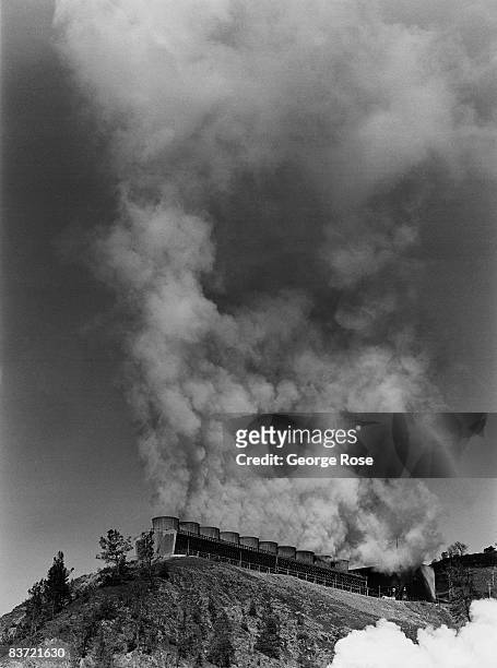 Steam billows from a turbine power plant that generates carbon and pollution free electrical energy in this 2008 Geyserville, California, photo. The...