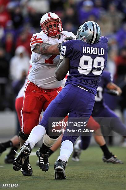 Offensive guard Matt Slauson of the Nebraska Cornhuskers blocks defensive end Brandon Harold of the Kansas State Wildcats during the third quarter on...