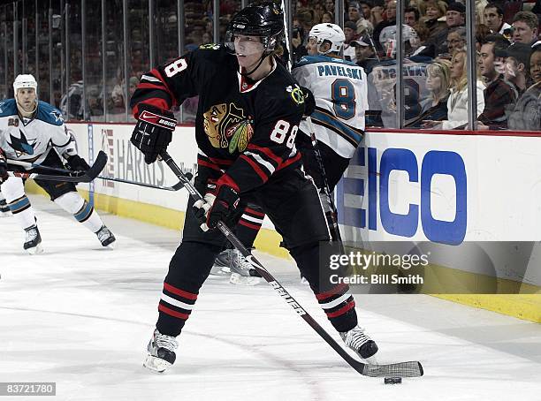 Patrick Kane of the Chicago Blackhawks gets ready to pass the puck during a game against the San Jose Sharks on November 16, 2008 at the United...