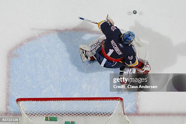 Michael Hutchinson of the Barrie Colts makes a save in a game against the London Knights on November 14, 2008 at the John Labatt Centre in London,...