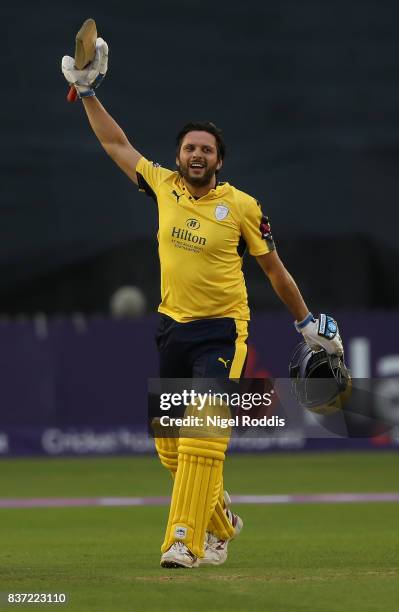 Shahid Afridi of Hampshire celebrates his century during the NatWest T20 Blast at The 3aaa County Ground on August 22, 2017 in Derby, England.