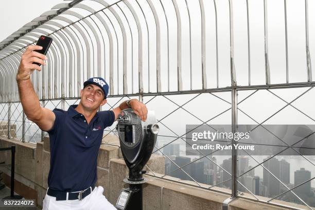 Billy Horschel takes a selfie on top of the Empire State Building during a preview media tour for THE NORTHERN TRUST on August 22, 2017 in New York...