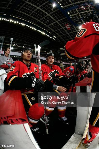 Jarome Iginla of the Calgary Flames watches the game from the bench in between shifts against the Toronto Maple Leafs on November 11, 2008 at...