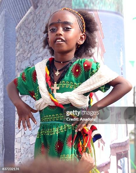 Asheda An Ethiopian Orthodox Christian girl dances during Ashenda Festival ...