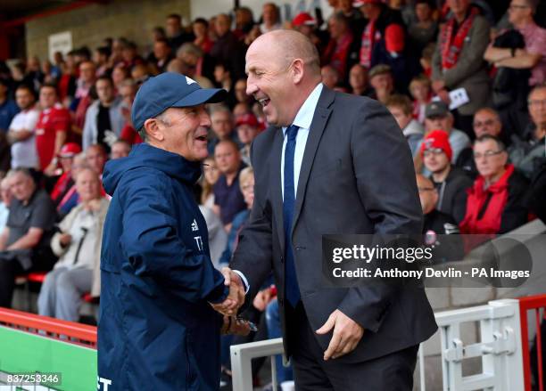 West Bromwich Albion manager Tony Pulis greets Accrington Stanley manager John Coleman during the Carabao Cup, Second Round match at the Wham...