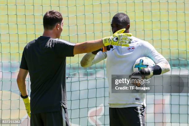 Goalkeeper-coach Frederik Goessling of RB Leipzig speak with Goalkeeper Yvon Mvogo of RB Leipzig during the Training Camp of RB Leipzig on July 21,...