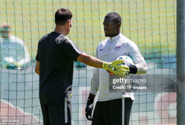 Goalkeeper-coach Frederik Goessling of RB Leipzig speak with Goalkeeper Yvon Mvogo of RB Leipzig during the Training Camp of RB Leipzig on July 21,...