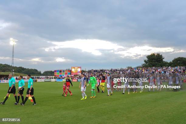 The teams head out for the Carabao Cup, Second Round match at the Wham Stadium, Accrington.