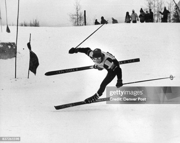 Duncan Cullman of Twin Mountain, N.H., performs a ballet on skis as he tries to recover from a too-wide turn in time to make the next gate. Skiers...