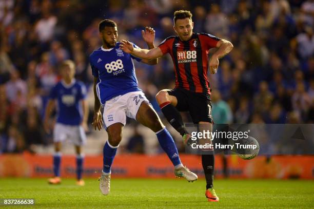David Davis of Birmingham City and Marc Pugh of AFC Bournemouth battle for possession during the Carabao Cup Second Round match between Birmingham...