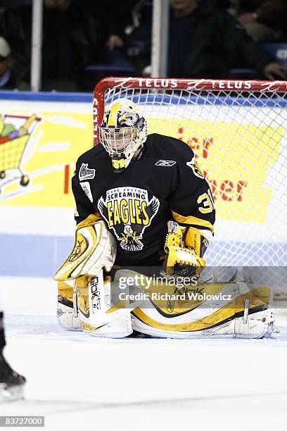 Olivier Roy of the Cape Breton Screaming Eagles stops the puck during the warm up period prior to facing the Quebec Remparts at the Colisee Pepsi on...