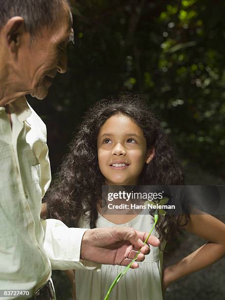grandfather and granddaughter in garden - xilitla stock pictures, royalty-free photos & images