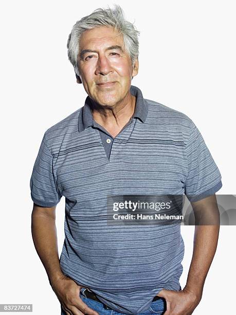 portrait of mature man - grey polo shirt stock pictures, royalty-free photos & images