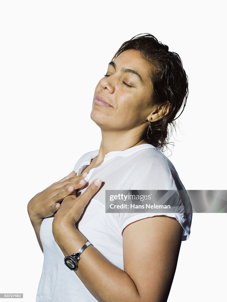 Portrait of woman with eyes closed, blissful