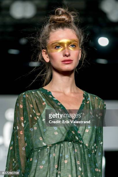 Model walks the runway at the Line Of Oslo show during the Fashion Week Oslo Spring/Summer 2018 on August 22, 2017 in Oslo, Norway.