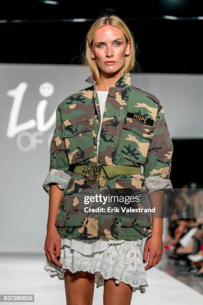 Model walks the runway at the Line Of Oslo show during the Fashion Week Oslo Spring/Summer 2018 on August 22, 2017 in Oslo, Norway.