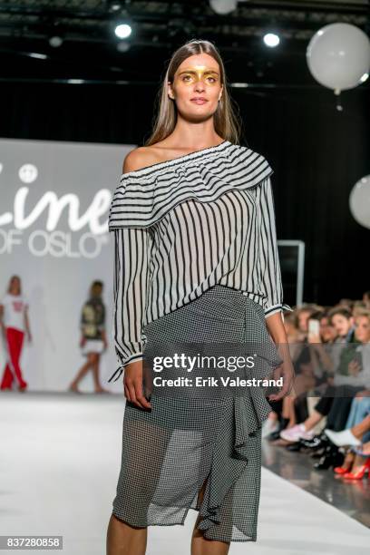 Model walks the runway at the Line Of Oslo show during the Fashion Week Oslo Spring/Summer 2018 on August 22, 2017 in Oslo, Norway.